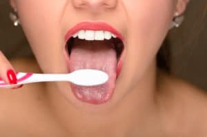 brush teeth and tongue